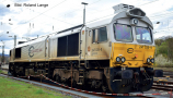 [Lokomotivy] &rarr;&nbsp;[Ostatn�]&nbsp;&rarr;&nbsp;[Ostrovn�]&nbsp;&rarr;&nbsp;HN9080: dieselov� lokomotiva �ed�-oran�ov�-�ed�, �ern� r�m a pojezd „Euro Cargo Rail“